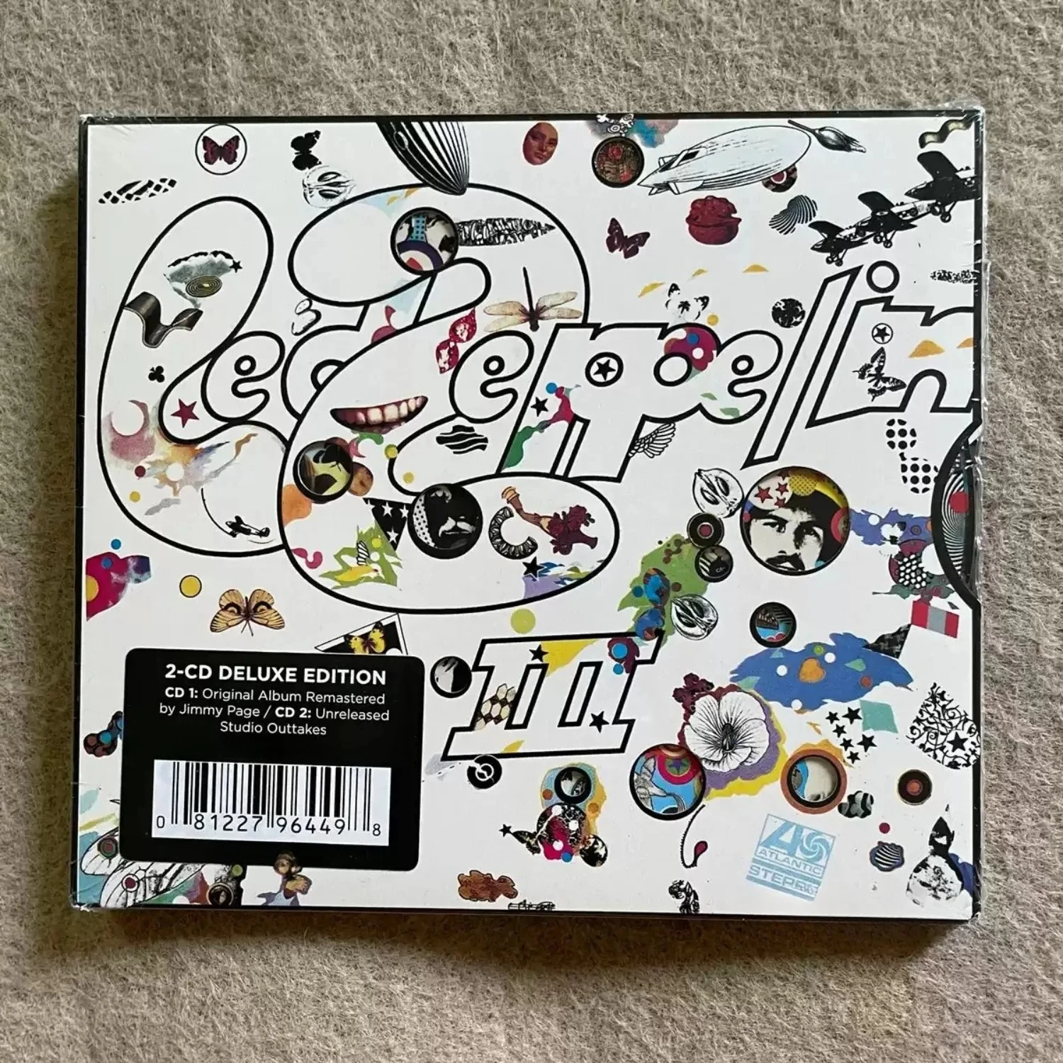2-Disc Deluxe Hard Rock Studio Album, Collage Graffiti Art Cover, Remastered Original Tracks Plus Unreleased Studio Demo Outtake