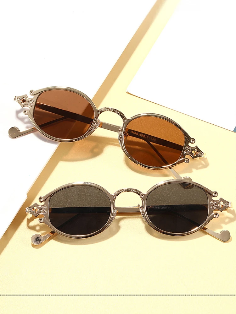 

Fashion Cat Eye Sstreet Shoot Man Sunglasses Women Retro Steampunk Glasses Gothic Oval Metal Frame Carved Sunglasses Gafas Sol