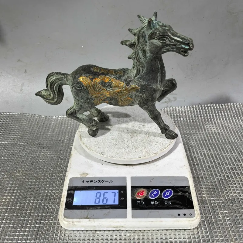 figurine, a decorative piece for the home, a bronze artifact depicting a horse treading on a flying swallow, a gift
