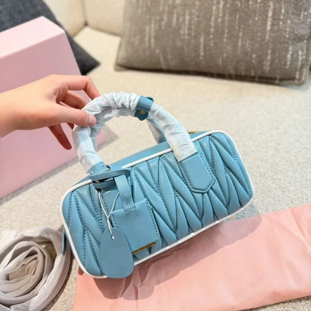 

New bowling bag 2025 classic pleated real leather bags joker fashion advanced portable crossboby bags Princess style Women's bag