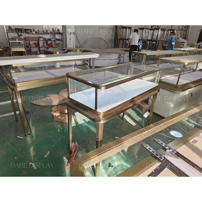 custom.Standard Electronic Jewelry Store Fixture Jewellery Display Golden Stainless Steel Showcase
