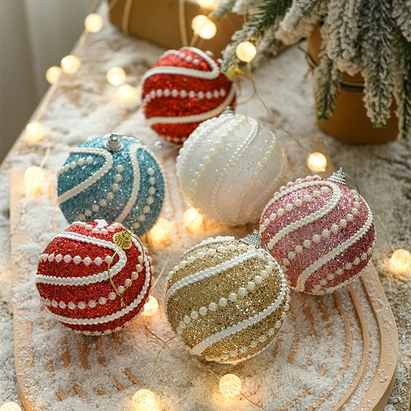 

Christmas decorative balls, combined with Christmas trees, lights, and snow scenery decorations, enhance the festive atmosphere