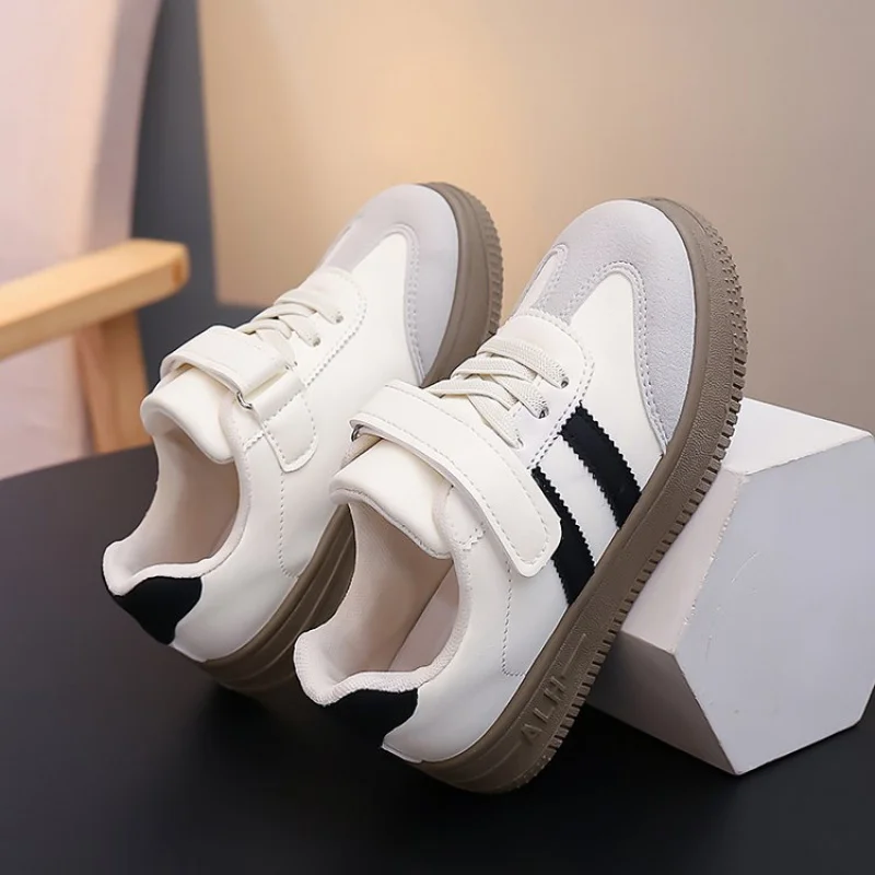 

2026НовинкаUnisexДетские повседневные кроссовкиBoysGirlsVelcroStrapМягкая подошваБелые туфлиДетские дышащиеСветные кроссовкиLowTopForSchoolCampus