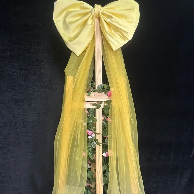 Large Yellow Bow Jewelry Display Stand Home Living Room Decor Christmas Tree Ornament Festive Atmosphere Scene Layout
