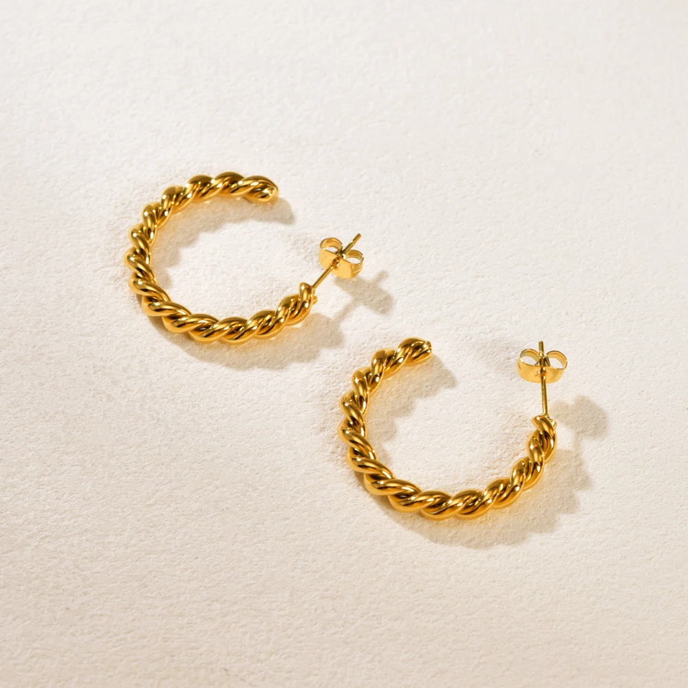 E119 twisted Wave Metal hollowed-out ins Ring Earrings, retro chic, golden stud stainless steel jewelry