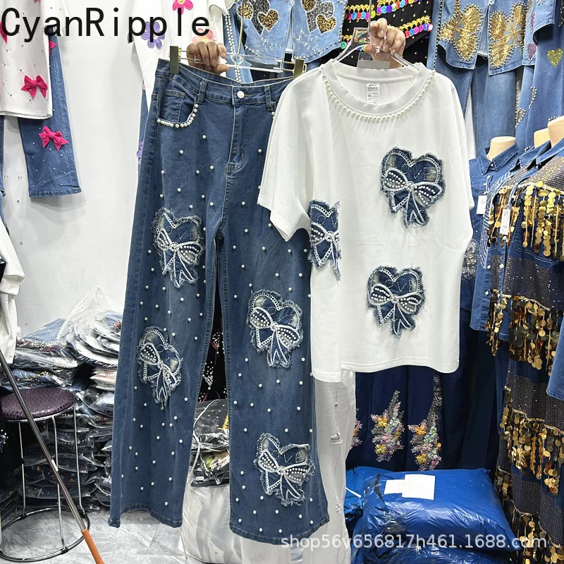 

Новый весенне-летний женский комплект из двух предметов, белая футболка с короткими рукавами и вышивкой бисером и бантом + широкие прямые джинсы с высокой талией