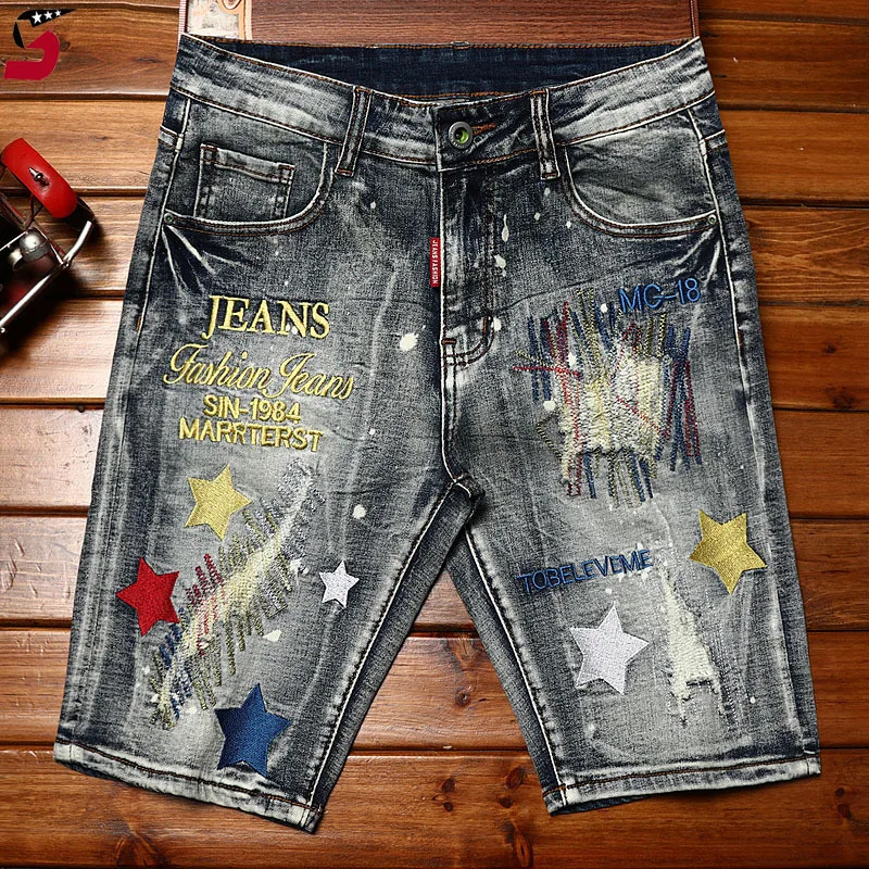 Marca de moda masculina high-end shorts jeans rasgados, tendência bordada, retrô, angustiado, casual, motocicleta, verão