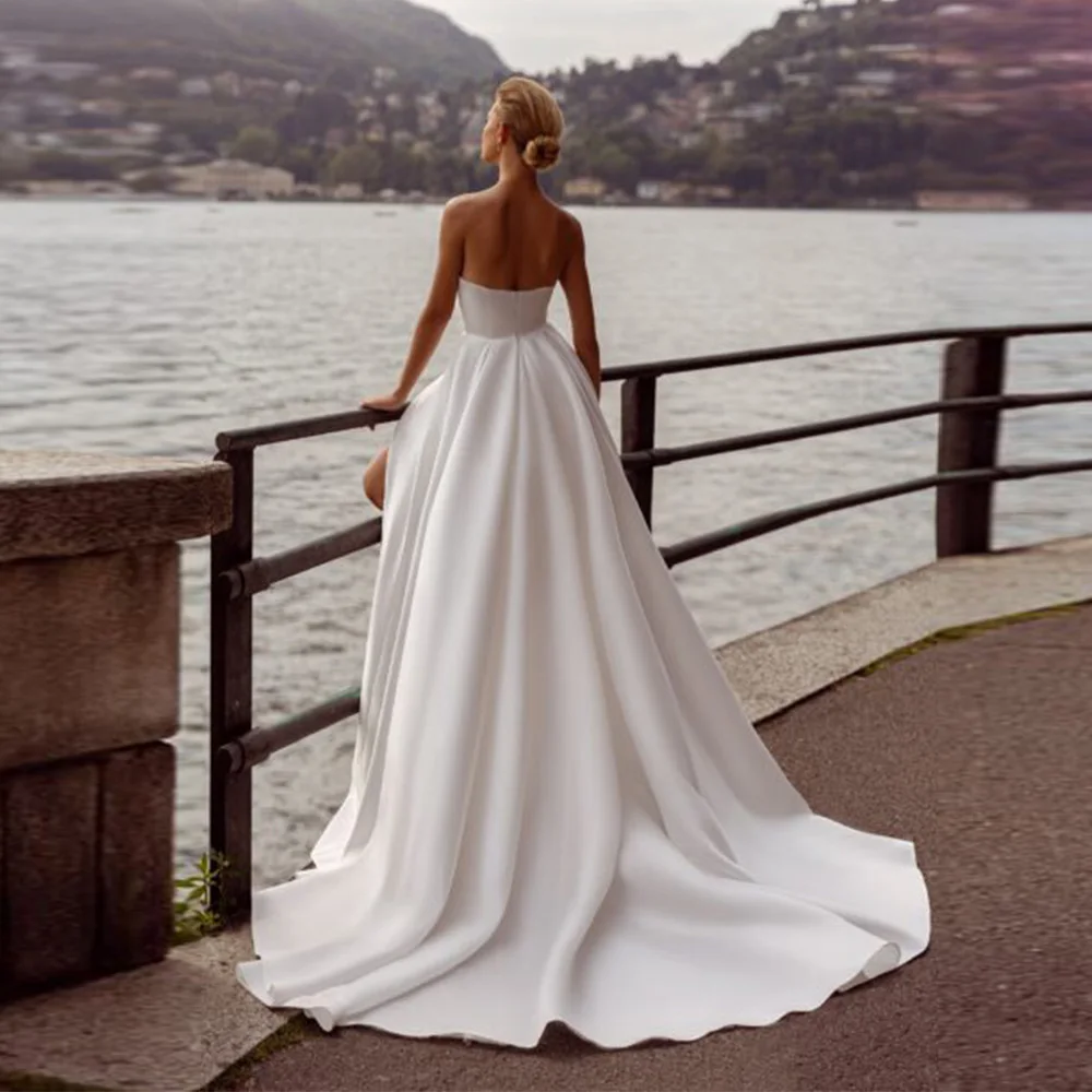 Personnaliser mesures a-ligne sans manches robes de mariée classique princesse Satin longueur de plancher robe de mariée haut côté renversé élégant