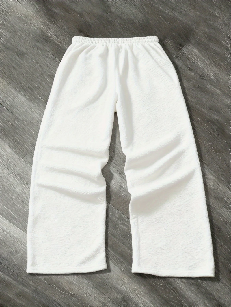 Men's Stylish Loose-Fit Trousers – Eye-catching design, comfortable fit; ideal for fitness enthusiasts and street-style lovers.