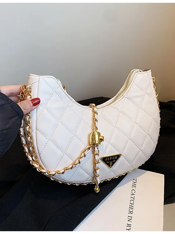 Bolso de piel de vaca con forma de media luna para mujer, bolsa de hombro con forma de luna redonda, nicho de Corea del Sur, novedad de 2024