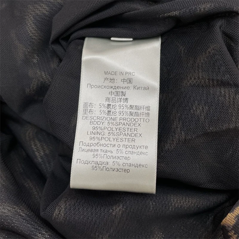 Abito da donna 2026 Primavera nuovo mini abito elastico Stampa leopardata girocollo abito corto Abiti da festa con abito avvolgente sui fianchi irregolari