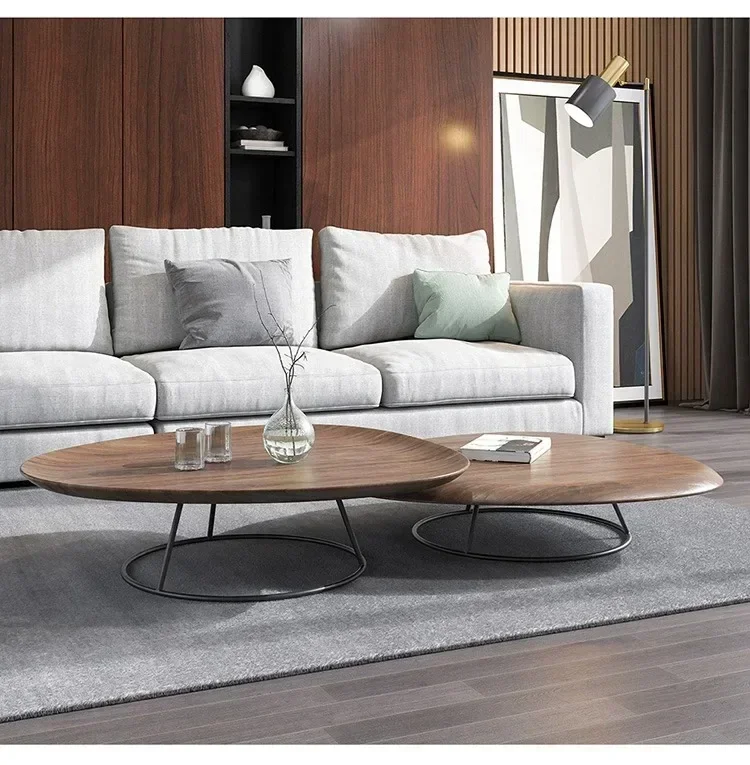 A  Nordic walnut modern simple Italian high and low round coffee table household special-shaped