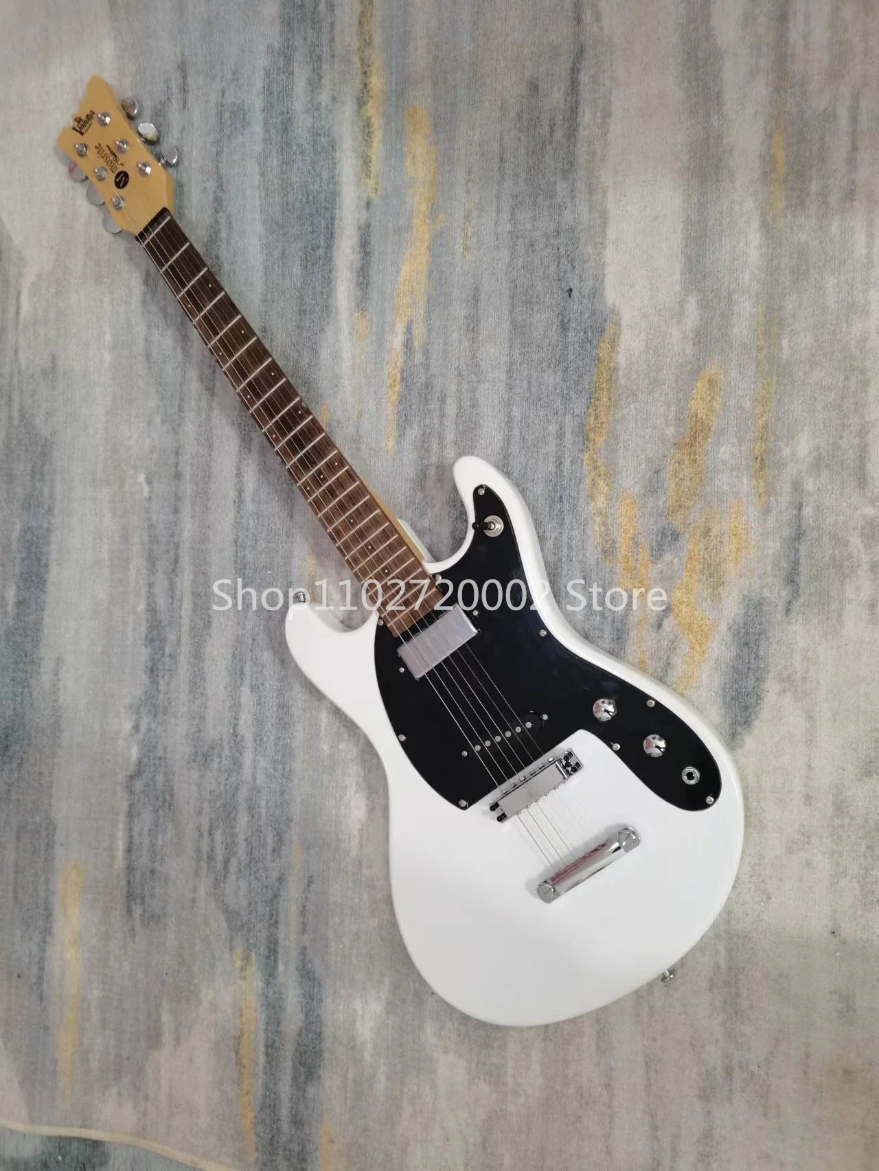 

6-string guitar, rosewood fingerboard, fixed bridge, silver accessories, seller to bear shipping costs