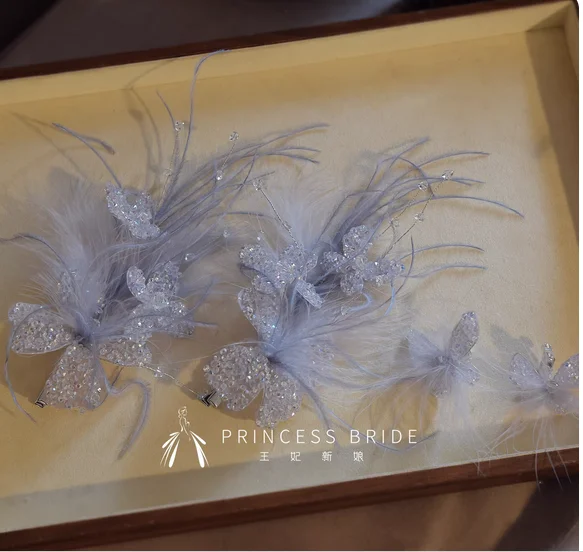 The original innovative silver-gray feather clip earrings high-end headdress studio with makeup luxury hair dressing morning gow