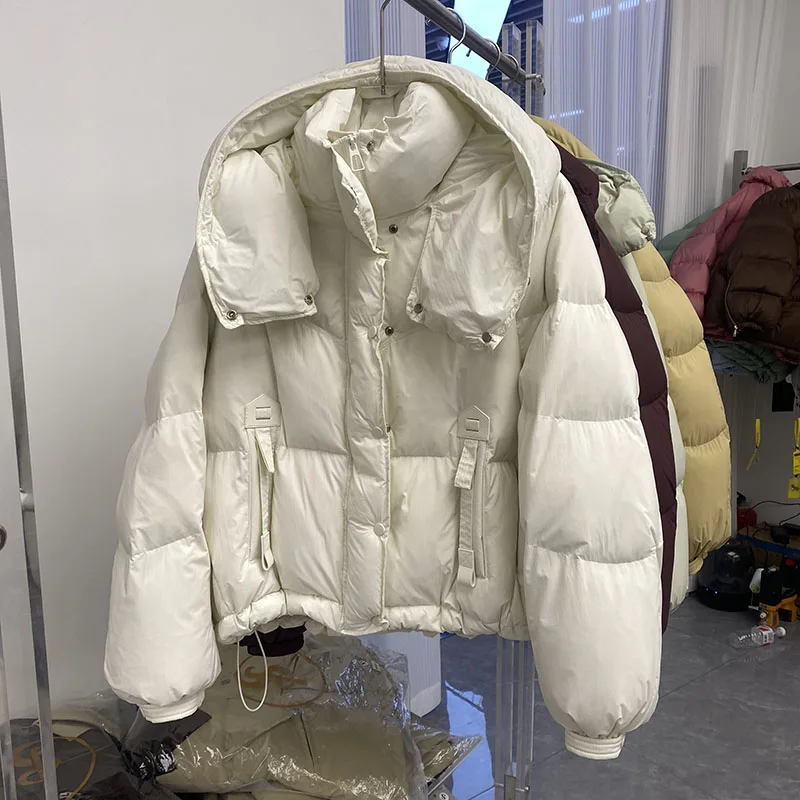 معطف نسائي من White Duck Down لعام 2025 سترات شتوية جديدة سميكة للنساء مع قلنسوة ومزاج فضفاض قصير سترات نسائية H568