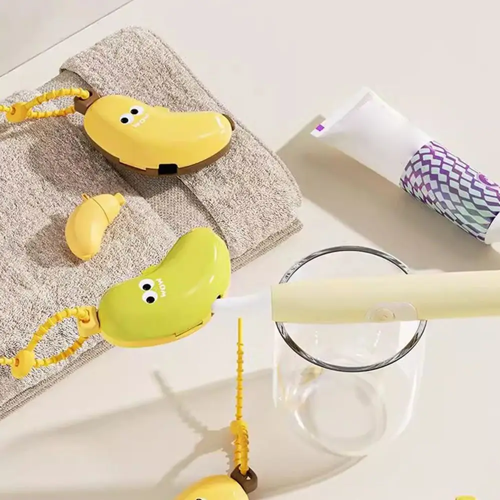 หัวแปรงสีฟันพลาสติกฝาครอบป้องกันแบบพกพากล้วยรูปร่างแปรงสีฟันกรณีหมวกแปรงป้องกัน 2in1