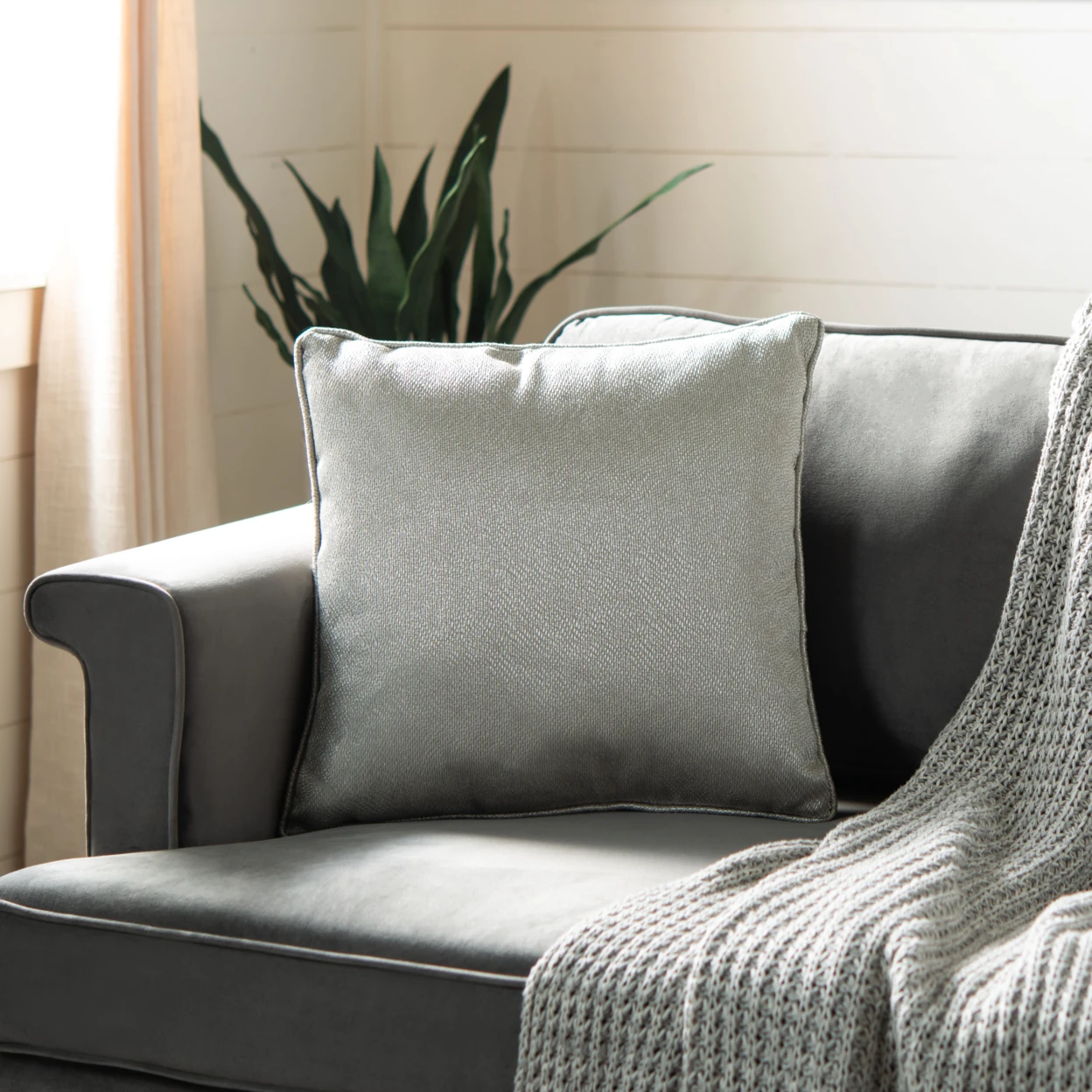 

18 inch square metallic plush pillow in light grey