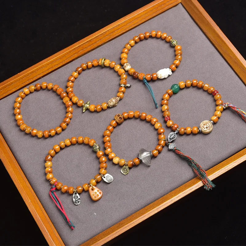 

Tibetan return camel bone barrel beads playing with strings single circle material ware A dummy Buddha bead bracelet