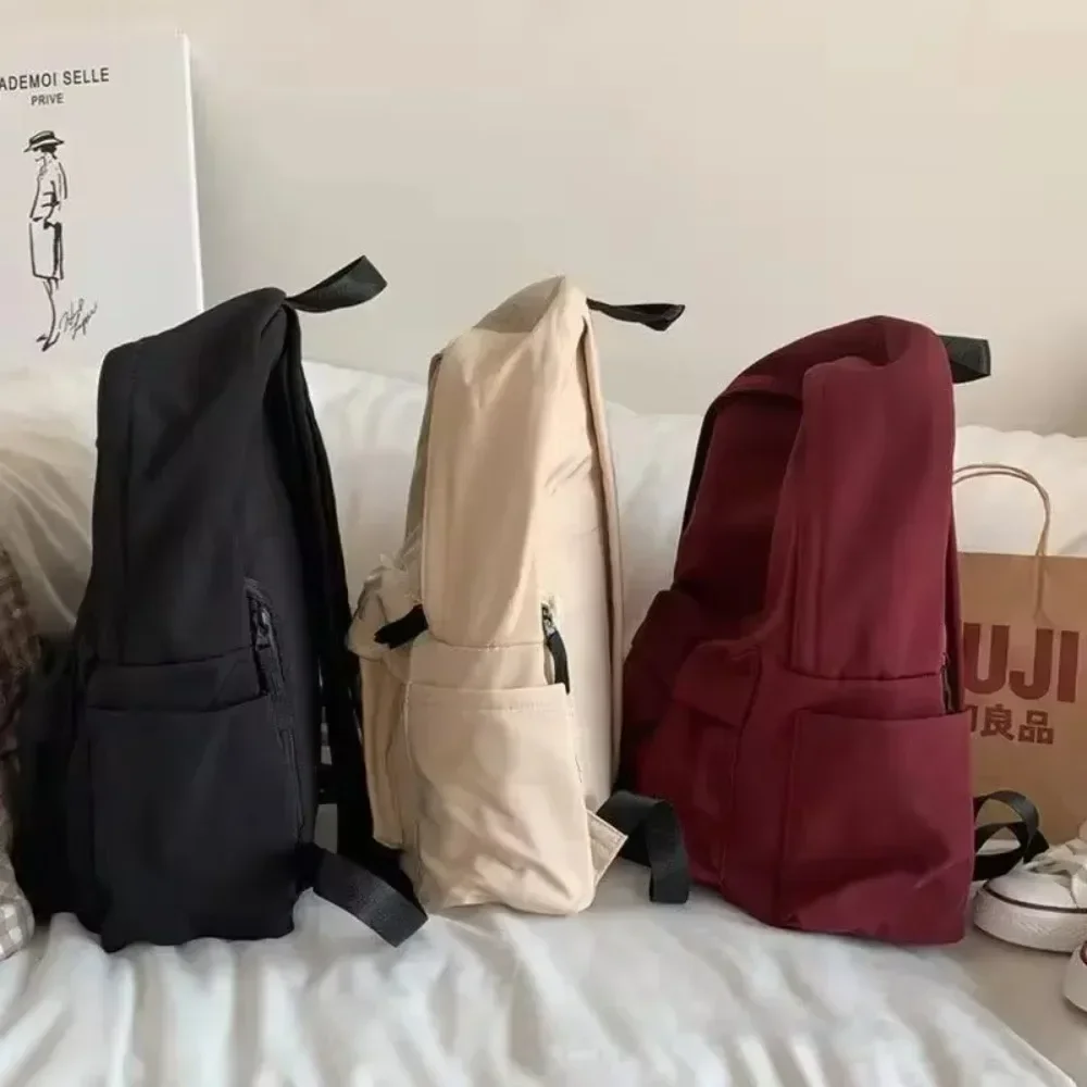 Plecaki damskie solidny czarny plecak o dużej pojemności modny Harajuku Casual Zipper wodoodporna torba studencka styl japoński Mochila