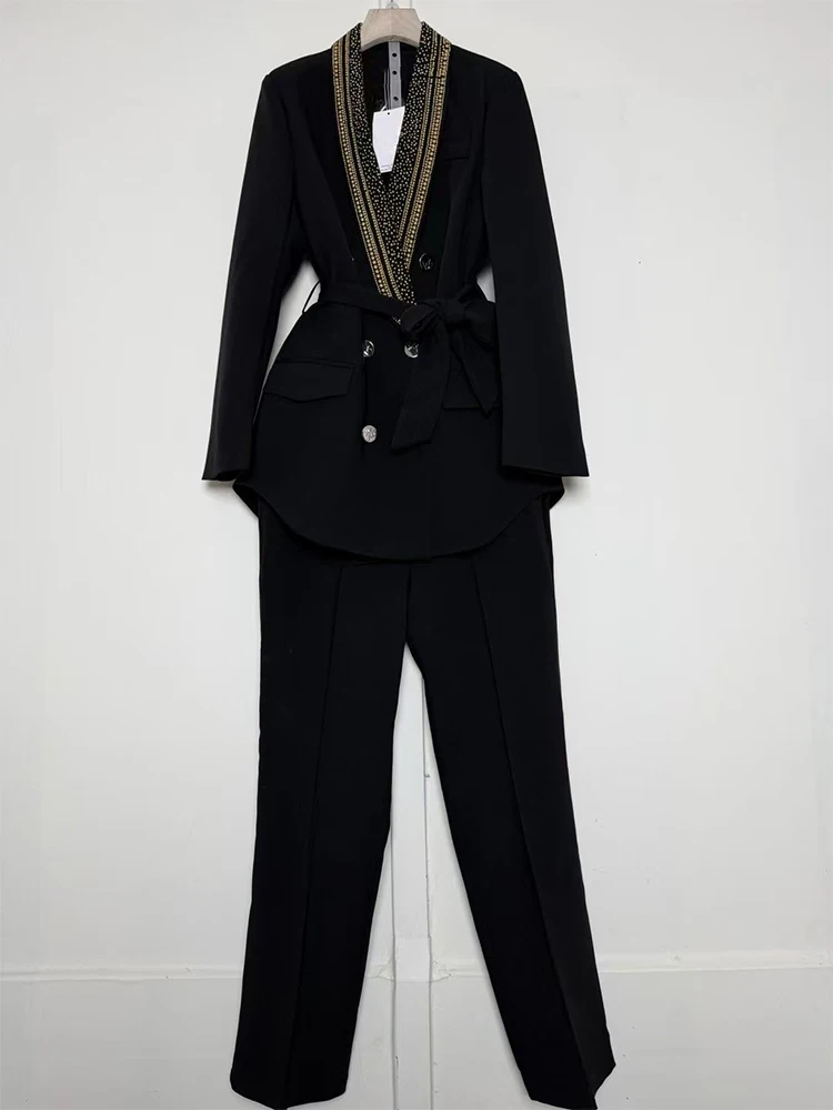 

A two-piece autumn women's suit jacket with a V-neck and double-breasted tie and a cinched waist, paired with straight-leg pants