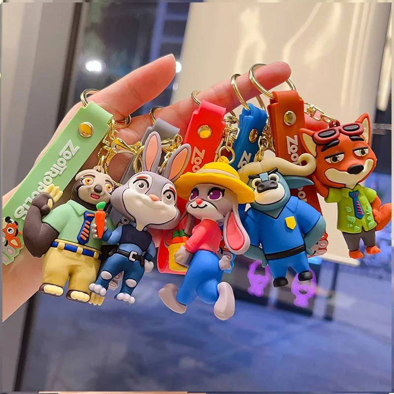 سلسلة مفاتيح Zootopia 1-6PSC: سلسلة مفاتيح مصغرة تتميز على تمثال جودي هوبس على الطراز الكرتوني، مناسبة للسيارات والحقائب والمفاتيح #1