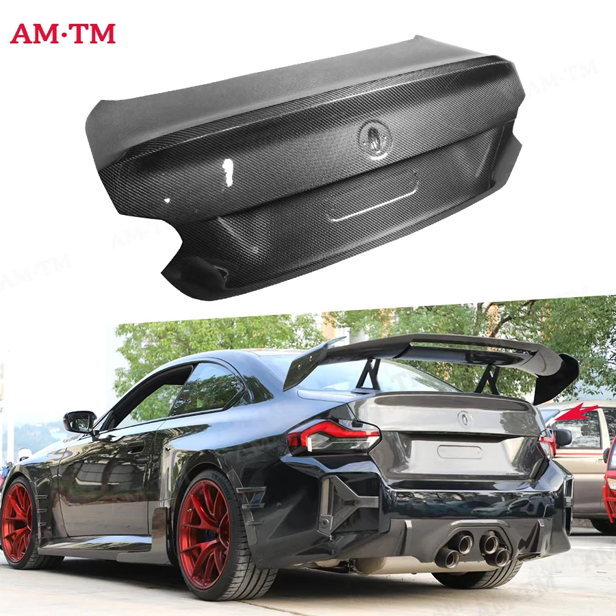 

For M2 G87 2022+ Carbon fiber trunk lid the trunk lid encloses the upper lid behind the trunk lid the Upgrade body kit