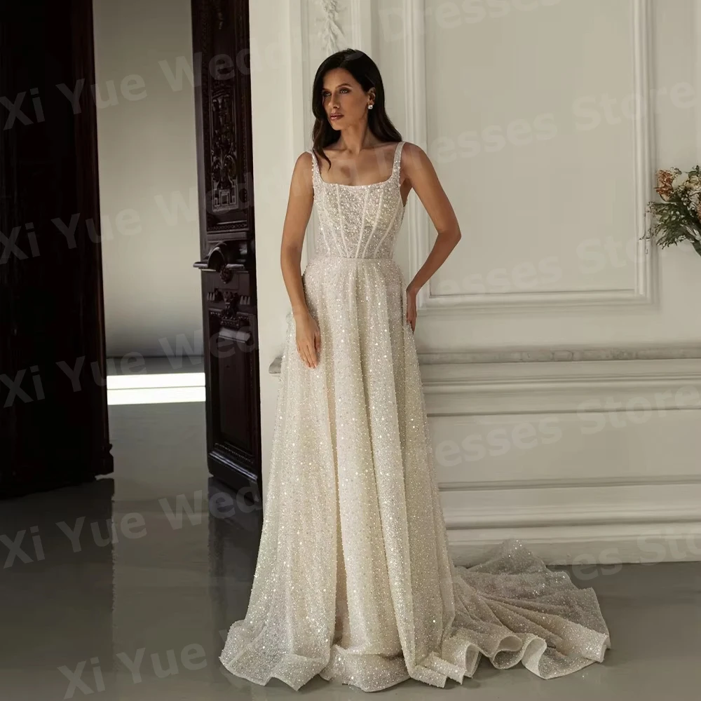 فساتين زفاف نسائية متألقة على شكل حرف A مطرزة فيستدو دي نوفيا أشرطة سباغيتي بدون ظهر فساتين العروس مخصصة رداء دي ماري