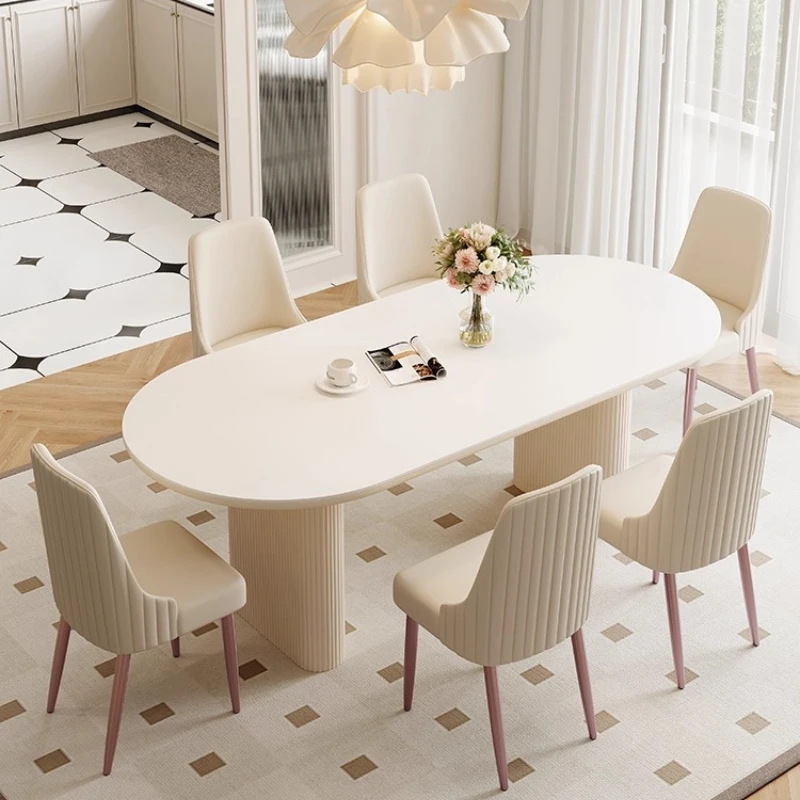 

Cream wind rock slab dining table simple household small apartment oval white French retro dining table and chairs