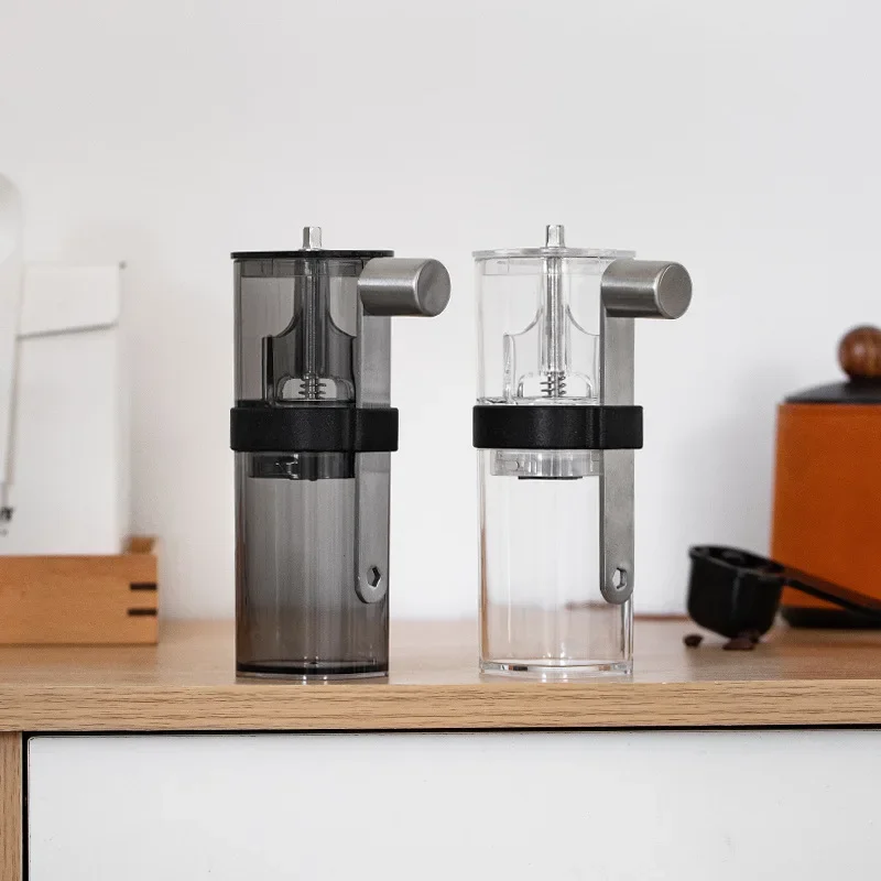 

The new transparent bean grinder Hand coffee machine can adjust the thickness of the home grinder in stock