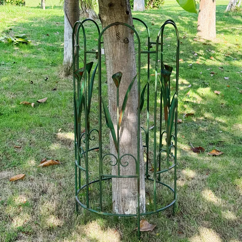 old outdoor wrought iron fence full circle fence climbing vine frame courtyard garden rose plant flower stand