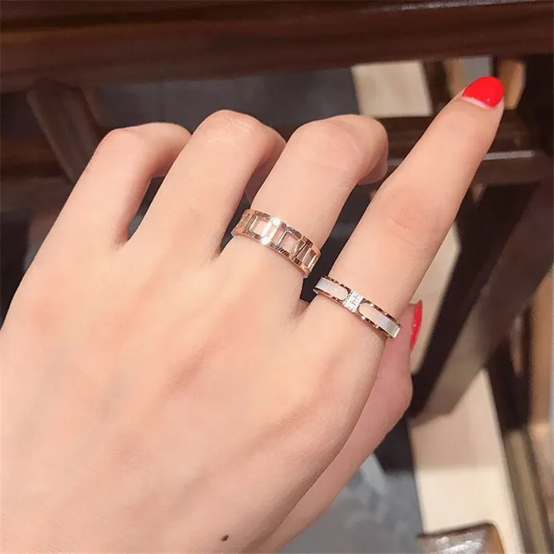 

Rose Gold Hollow out Roman Numerals Lovers Ring Fashion Stainless Steel Jewelry for Women Gift Never Fade