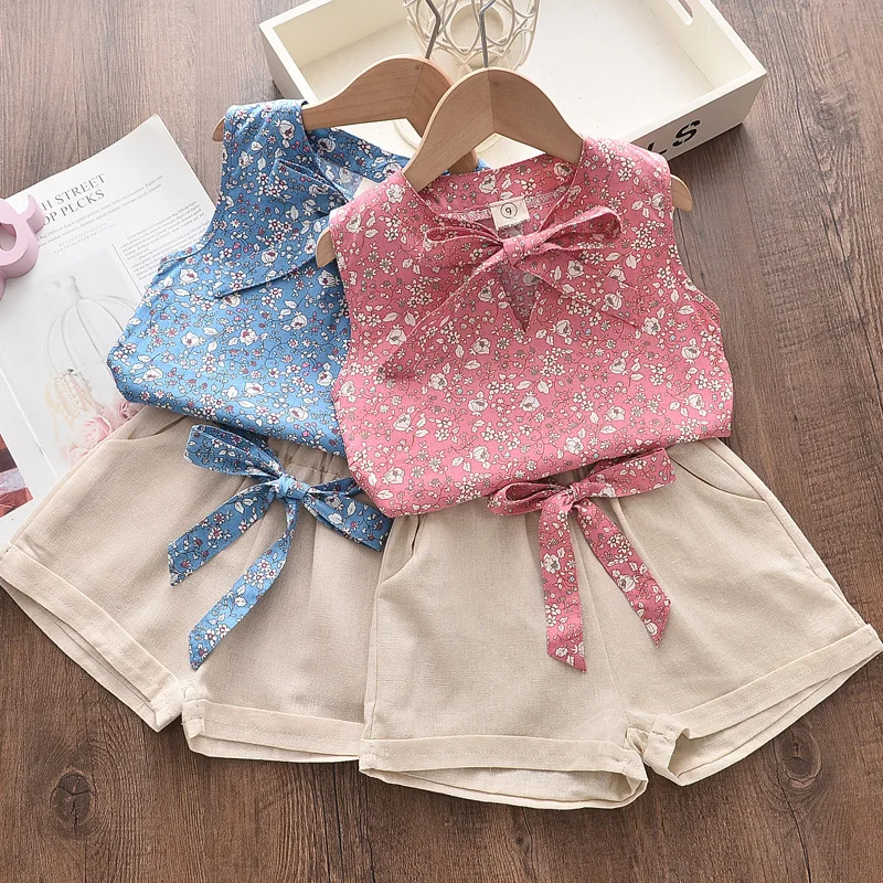 

Summer Baby Girls Stylish Cotton Floral Bow Tie Sleeveless Shirt Top+Shorts Set School Kids 2PCS Tracksuit Children Outfit 2-6Yr