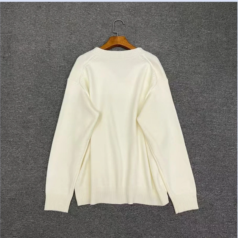 Maglione lavorato a maglia di lana a maniche lunghe con scollo a V allentato di nicchia nordica da donna 24 autunno e inverno nuovo articolo