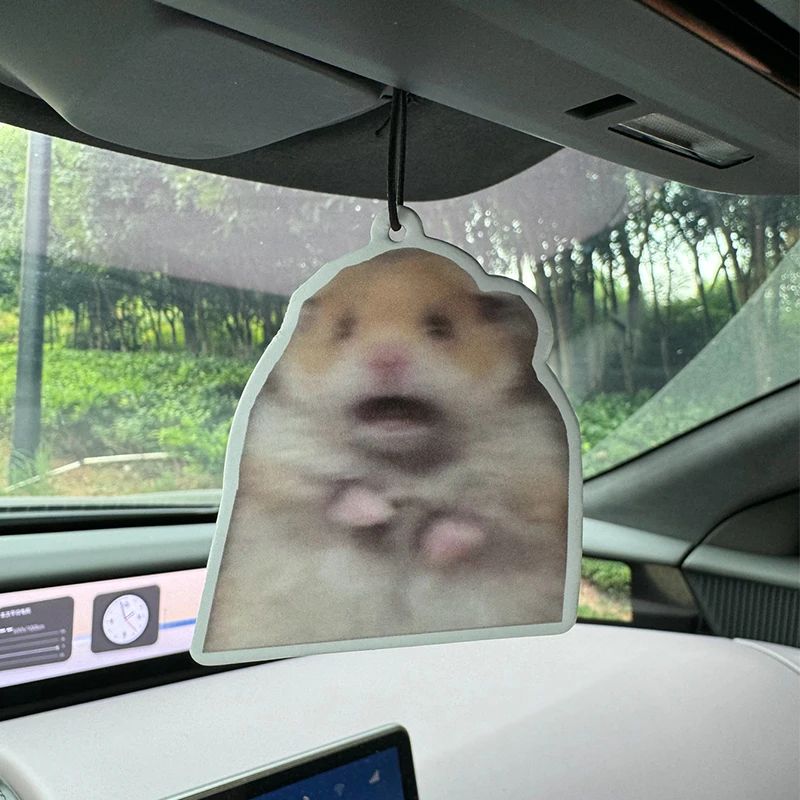 Hamster Meme Hilton (Hotel Scent) Car Air Freshener |   Rearview Mirror Hanger & Dual-Purpose Air Vent Clip |   Natural Material Aromatherapy Tablets |   Long-Lasting Fragrance for 90 Days |   Alcohol-Free |   Not Afraid of Direct Exposure to the Sun |   Designed Specifically for Odor Removal in Cars, Closets, and Bathrooms. |   Cartoon Animation Graphics |   Unisex |   Luxury-Grade Fragrance |   Five-Star Rating