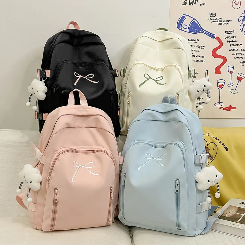 

Элегантный однотонный рюкзак с вышитым бантом, 1 шт., легкий и просторный для школы и поездок на работу, нишевая эргономичная сумка для книг