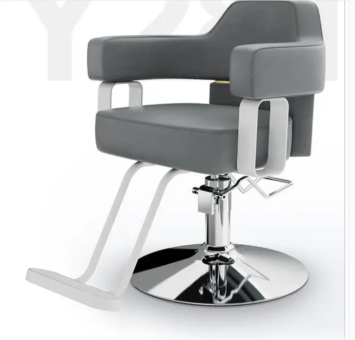 

The barber's chair in the barber's shop The barber's chair in the barber's salon can be lifted and lowered. Salon furniture, sal