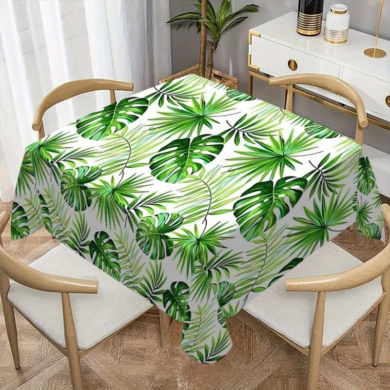 a 【Product】 1pc Tablecloth with Tropical Leaf Pattern, featuring a fresh and natural style