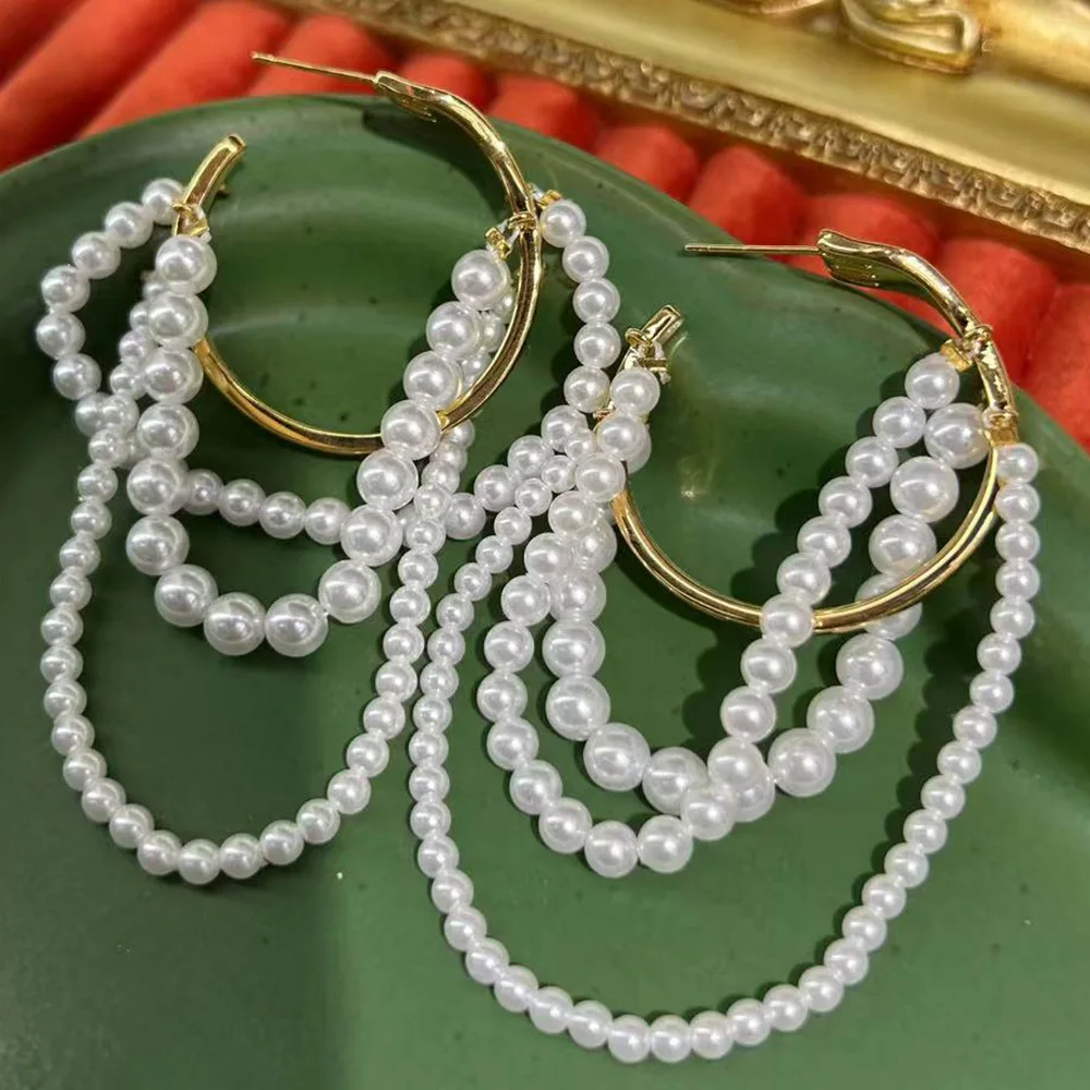 Hejia tassel handmade ins cross-border hot-selling high-end imitation pearl Maillard light luxury simple is S925 earrings