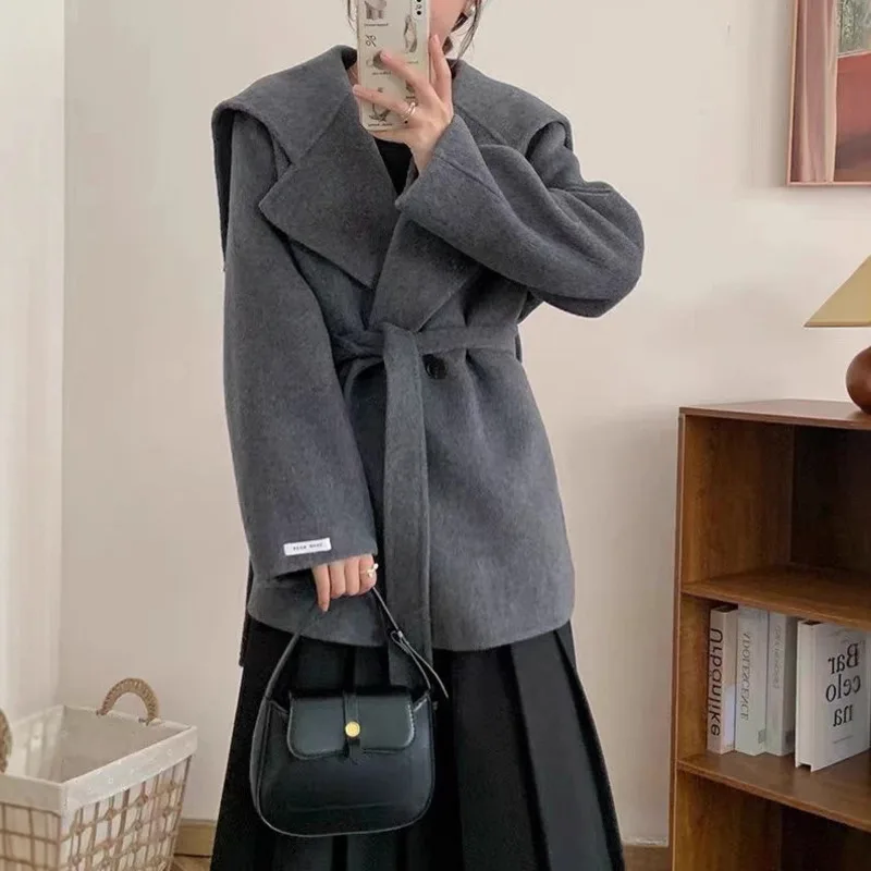 

EAEOVNI зимняя шерстяная куртка для женщин, модное однотонное пальто с воротником с лацканами и длинными рукавами на пуговицах на шнуровке, повседневное пальто 2026, новая одежда