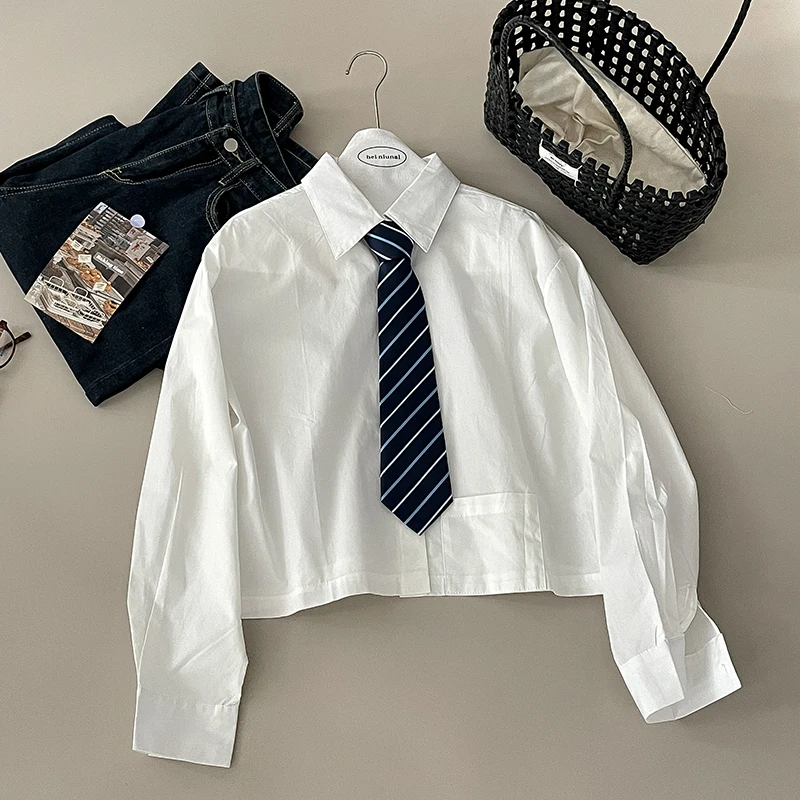 

Wedbleser Solid Color Long Sleeved Sunscreen Striped Tie Shirt Women Summer 2025 New Casual Versatile Cardigan Pocket Top