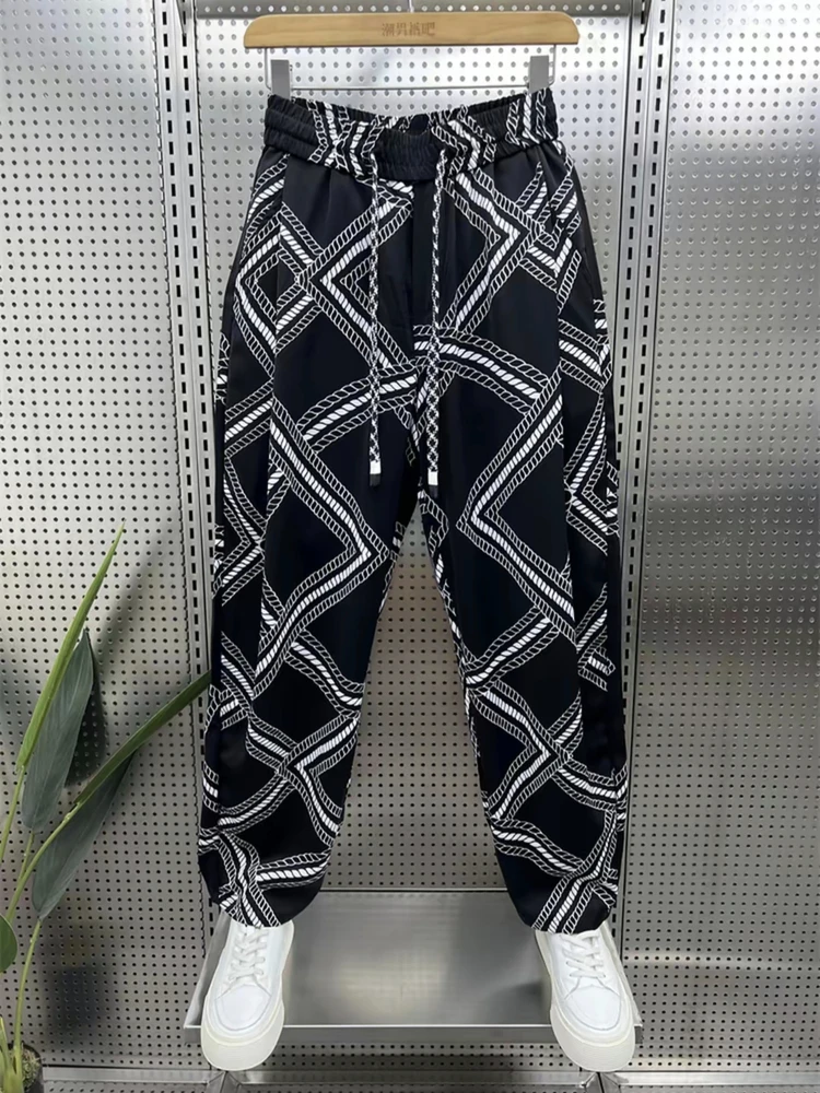 

Новые летние мужские модные брюки с узором под змеиную кожу, легкие, свободные, из ледяного шелка, с эффектом драпировки, повседневные, прямого кроя