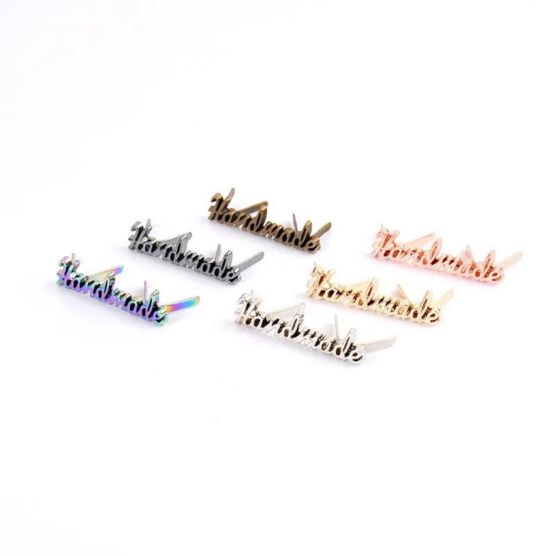 Custom metal letter labels, metal Custom labels logo personalized custom metal labels suitable for clothing bags hats and shoes.