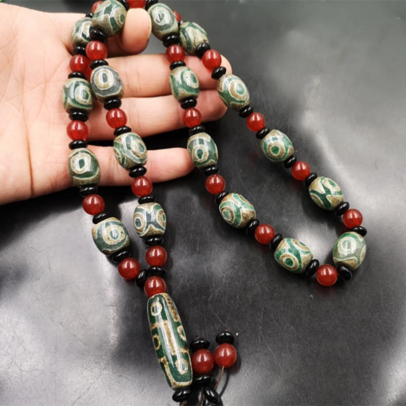 Nine-Eyed Sweater T…