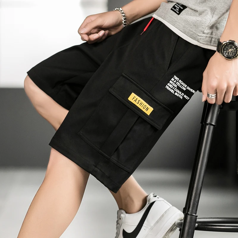 شورت ملابس العمل للرجال مع حزام خصر مطاطي كاجوال وتصميم برباط، يتميز بحزام خصر كبير ومطاط كلاسيكي