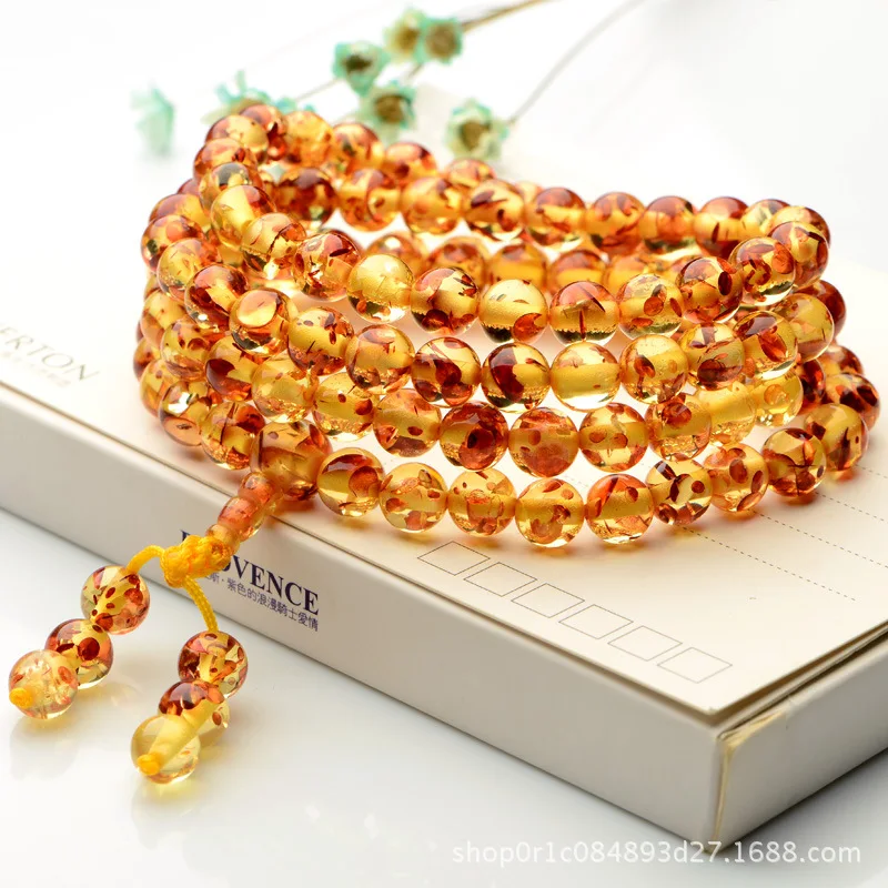 

Baltic amber beeswax bracelet with floating flowers amber beeswax bracelet 108 beads necklace prayer beads sweater chain
