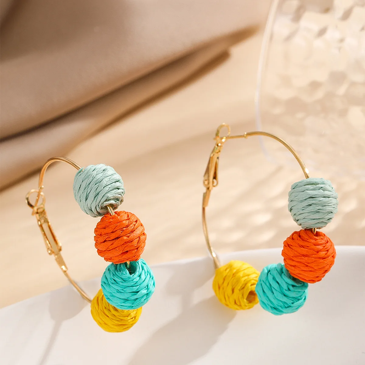 Fashion explosive color ball C-shaped Raffia hand-woven rattan fashion all-matching earrings stud creative all-matching
