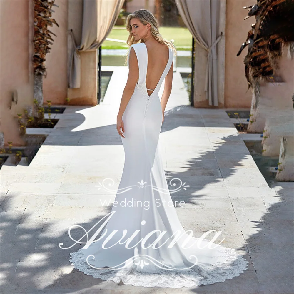 Aviana مخصص الخامس الرقبة عارية الذراعين حورية البحر فستان الزفاف الدانتيل والتطريز يزين بلا أكمام زر سويب تراين موردن بسيط