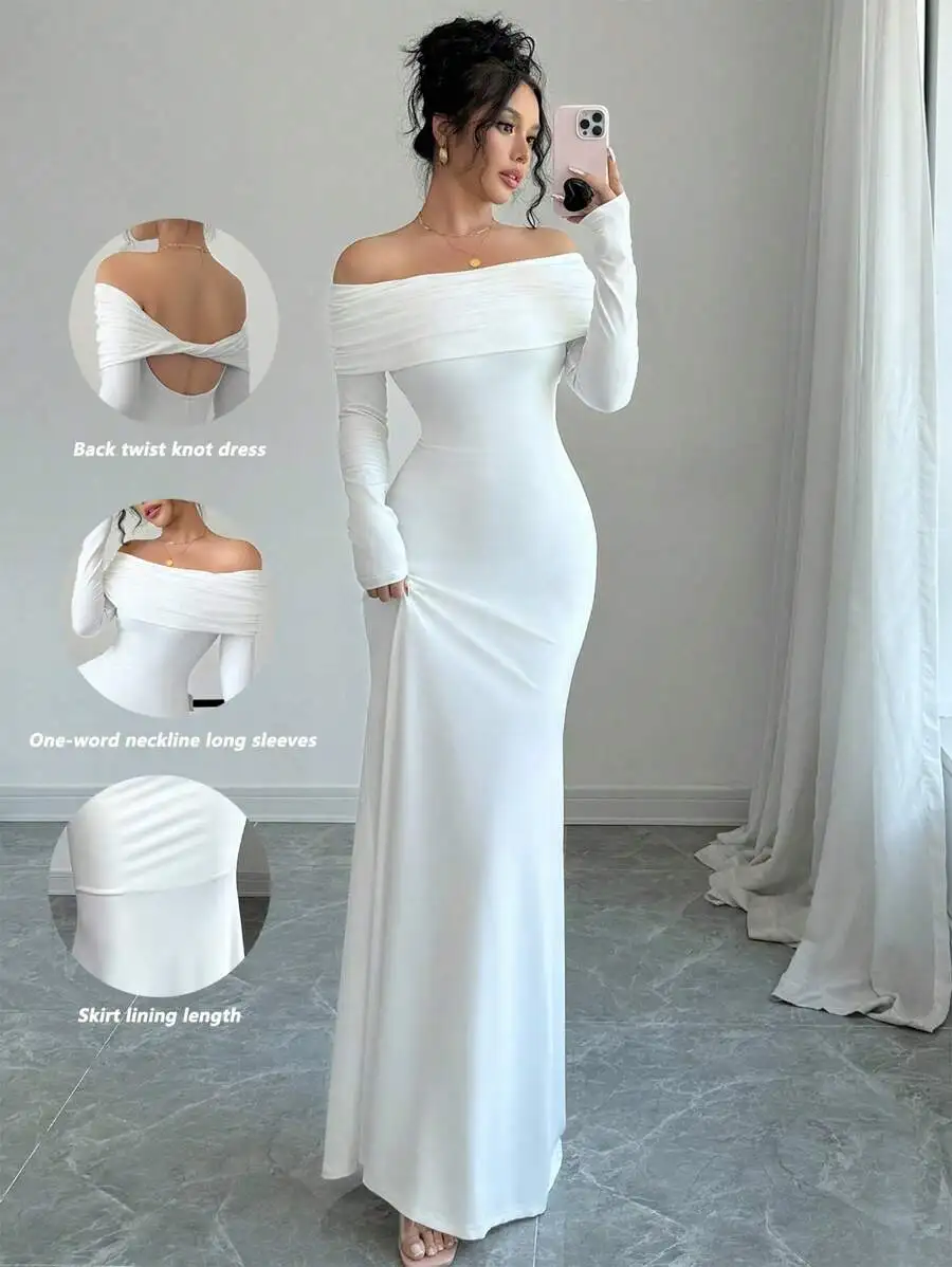 

Белое платье-русалка с открытыми плечами, длинными рукавами и завязкой на спине