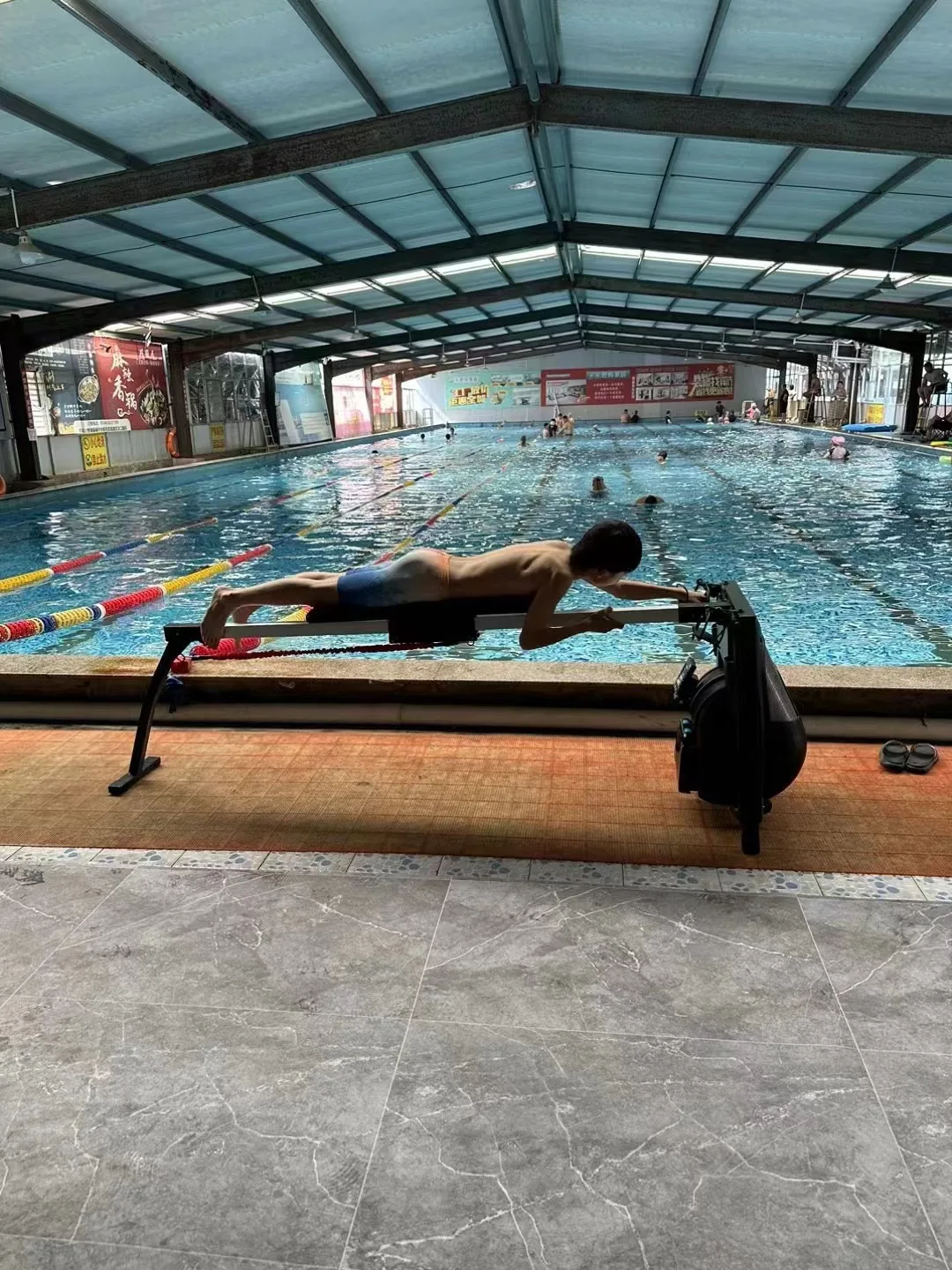 Adjustable Resistance Land Swimming Trainer Compact Stationary Swim Exercise Machine for Home Low Impact Cardio Workout