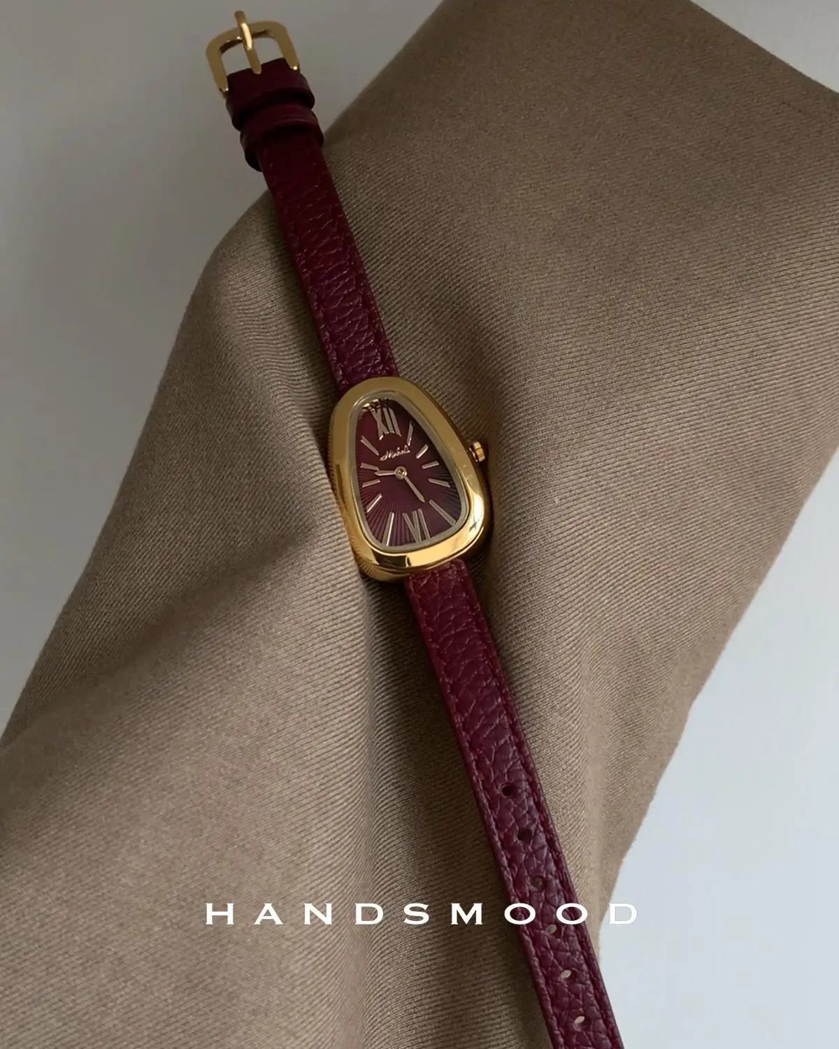 Nieuw slangvormig dameshorloge uit 2025 met echt leren band, vintage horloge met Romeinse cijfers, lichte luxe